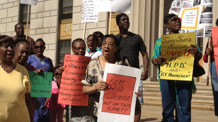 racey Towers tenants rallied in the Bronx before suing their landlord and the city over a 65% rent hike.